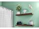 Close up of decorative shelving in the bathroom, showcasing stylish decor and providing practical storage at 5750 Oyster Catcher Dr. # 333, North Myrtle Beach, SC 29582