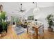 Inviting living area featuring hardwood floors, vaulted ceilings, a ceiling fan, and lots of natural light at 5750 Oyster Catcher Dr. # 333, North Myrtle Beach, SC 29582