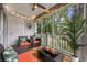Relaxing screened porch with comfortable wicker furniture and views of the surrounding landscape at 5750 Oyster Catcher Dr. # 333, North Myrtle Beach, SC 29582