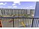 Condo balcony overlooking parking lot and other condo buildings at 5905 South Kings Hwy. # 433, Myrtle Beach, SC 29575