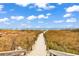 Sandy path guides you from the building to the beach for fun in the sun and sand at 5905 South Kings Hwy. # 433, Myrtle Beach, SC 29575