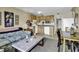 Open kitchen and living area, featuring wood cabinets and white appliances at 5905 South Kings Hwy. # 433, Myrtle Beach, SC 29575
