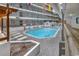 A lovely indoor pool sits among colorful chairs and multi-story lodging with views from every room at 5905 South Kings Hwy. # 433, Myrtle Beach, SC 29575
