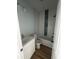A bathroom featuring a vanity sink, toilet, a tub, and decorative tile accent at 6001 - 1766 S Kings Hwy., Myrtle Beach, SC 29575