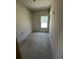 Unfinished bedroom with drywall, window, and exposed electrical wiring at 6001 - 1766 S Kings Hwy., Myrtle Beach, SC 29575