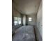 Unfinished bedroom with drywall, windows, and exposed wiring at 6001 - 1766 S Kings Hwy., Myrtle Beach, SC 29575