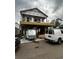 The home is under construction and shows the deck and framing with a trailer and construction van parked nearby at 6001 - 1766 S Kings Hwy., Myrtle Beach, SC 29575