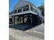 An elevated two-story home showcasing a black iron balcony, stilts for parking, and a convenient stairway at 6001 - 1766 S Kings Hwy., Myrtle Beach, SC 29575