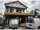 The home is under construction and shows the deck and framing with a trailer and construction van parked nearby at 6001 - 1766 S Kings Hwy., Myrtle Beach, SC 29575