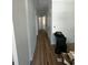 Hallway boasts wood floors, crisp molding, and multiple doorways, creating an open and inviting atmosphere at 6001 - 1766 S Kings Hwy., Myrtle Beach, SC 29575