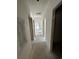 Hallway view towards the home's entry with natural light at 6001 - 1766 S Kings Hwy., Myrtle Beach, SC 29575