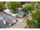Lovely aerial view showcases home nestled among mature trees with nearby homes at 6001 - 1807 S Kings Hwy., Myrtle Beach, SC 29575
