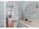 Well-lit bathroom with modern fixtures, a view to the house and ample counter space at 6001 - 1807 S Kings Hwy., Myrtle Beach, SC 29575