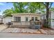 Charming beach home featuring a spacious wooden deck, convenient parking, and storage shed for all your beach necessities at 6001 - 1807 S Kings Hwy., Myrtle Beach, SC 29575