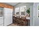 Kitchen featuring a breakfast bar, bright windows, ample counter space, and an efficient layout at 6001 - 1807 S Kings Hwy., Myrtle Beach, SC 29575