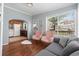 Inviting living room with hardwood floors, comfortable seating, and a seamless flow into the adjacent kitchen area at 6001 - 1807 S Kings Hwy., Myrtle Beach, SC 29575