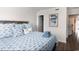 Cozy bedroom featuring a comfortable bed with fish-themed bedding and a decorative headboard at 6001 N Ocean Blvd. # 342, North Myrtle Beach, SC 29582