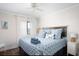 Tranquil bedroom with a queen-sized bed, bright lighting, and serene beach-inspired decor at 6001 N Ocean Blvd. # 342, North Myrtle Beach, SC 29582