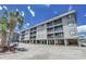 Coastal condo building with ample parking and elevated structure near the beach and ocean at 6001 N Ocean Blvd. # 342, North Myrtle Beach, SC 29582