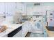 Bright, clean kitchen with white cabinets, subway tile backsplash, and stainless steel sink at 6001 N Ocean Blvd. # 342, North Myrtle Beach, SC 29582