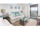 Comfortable living room with white sofas, beach-themed decor, and a cozy, inviting atmosphere at 6001 N Ocean Blvd. # 342, North Myrtle Beach, SC 29582
