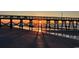 Stunning silhouette of pier with sun rays through the pier framework at 6001 N Ocean Blvd. # 342, North Myrtle Beach, SC 29582