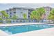 A refreshing pool area, surrounded by lounge chairs and palm trees, offering a relaxing outdoor experience at 6001 N Ocean Blvd. # 342, North Myrtle Beach, SC 29582