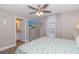 Comfortable bedroom featuring a large bed, natural light, and stylish decor at 6001-8026 South Kings Hwy., Myrtle Beach, SC 29575