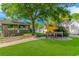 Well-maintained campground with grassy lawn, shady trees, and relaxing seating area, ideal for outdoor enjoyment at 6001-8026 South Kings Hwy., Myrtle Beach, SC 29575