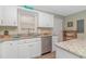 Well-equipped kitchen with granite countertops, stainless steel appliances, and white cabinetry at 6001-8026 South Kings Hwy., Myrtle Beach, SC 29575