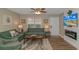 Inviting living room with comfortable seating, stylish decor, and a modern fireplace at 6001-8026 South Kings Hwy., Myrtle Beach, SC 29575
