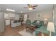 Inviting living room with comfortable seating and a kitchen island with bar stool seating at 6001-8026 South Kings Hwy., Myrtle Beach, SC 29575
