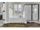 Elegant bathroom featuring a soaking tub, a separate shower, and tasteful finishes at 6239 Chadderton Circle, Myrtle Beach, SC 29579