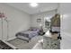 Cozy bedroom featuring neutral carpeting, natural light, and a calming atmosphere perfect for relaxation at 6239 Chadderton Circle, Myrtle Beach, SC 29579