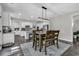 Cozy dining area with hardwood floors adjacent to the kitchen at 6239 Chadderton Circle, Myrtle Beach, SC 29579