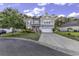 Charming two-story home with a well-manicured lawn and a driveway leading to a two-car garage at 6239 Chadderton Circle, Myrtle Beach, SC 29579