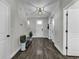Welcoming foyer with beautiful wood flooring and coat closet at 6239 Chadderton Circle, Myrtle Beach, SC 29579