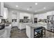 Well-equipped kitchen with granite countertops, stainless appliances and ample storage at 6239 Chadderton Circle, Myrtle Beach, SC 29579