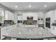 Bright kitchen featuring granite countertops, stainless appliances, and custom cabinetry at 6239 Chadderton Circle, Myrtle Beach, SC 29579
