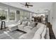 Bright living room with plush seating and an open floor plan leading to the kitchen at 6239 Chadderton Circle, Myrtle Beach, SC 29579