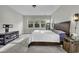 Comfortable main bedroom featuring soft carpeting, neutral tones, and an abundance of natural light at 6239 Chadderton Circle, Myrtle Beach, SC 29579
