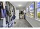 Bright walk-in closet offering organized storage with rods and shelves, complemented by natural light at 6239 Chadderton Circle, Myrtle Beach, SC 29579