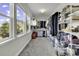 Spacious walk-in closet featuring built-in shelving, ample storage space, and natural light from large windows at 6239 Chadderton Circle, Myrtle Beach, SC 29579