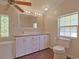 Traditional bathroom featuring a single sink vanity, decorative mirror, and tiled floors at 6544 Amberwood Ct., Myrtle Beach, SC 29588