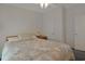 Comfortable bedroom features a traditional quilt, matching furnishings, and two closets at 6544 Amberwood Ct., Myrtle Beach, SC 29588