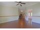 A bright room with wood-look floors, natural light and ceiling fan at 6544 Amberwood Ct., Myrtle Beach, SC 29588