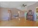 Spacious living area with hardwood floors, a ceiling fan, and classic design at 6544 Amberwood Ct., Myrtle Beach, SC 29588