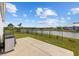 Scenic backyard with a patio overlooking a tranquil pond, perfect for outdoor relaxation and entertaining at 6591 Cagliari Court, Myrtle Beach, SC 29572