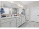 Elegant bathroom with double vanity, ample storage, and contemporary fixtures at 6591 Cagliari Court, Myrtle Beach, SC 29572