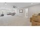 Large bonus room offering versatile living space with recessed lights and ample natural light at 6591 Cagliari Court, Myrtle Beach, SC 29572